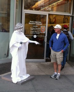 Our "living statue" distributes promotional flyers in the run-up to the game.